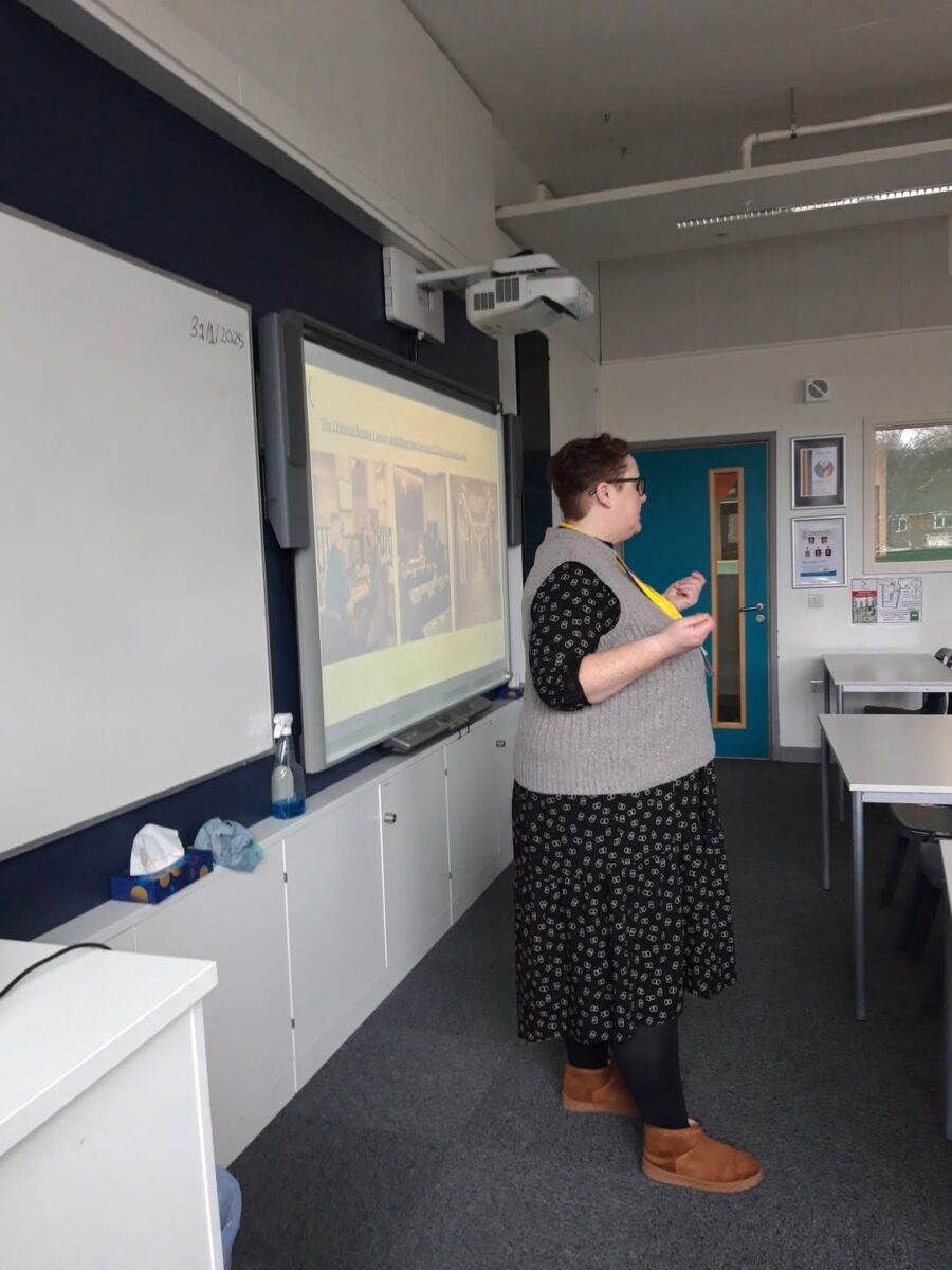 A lecturer talking to a class