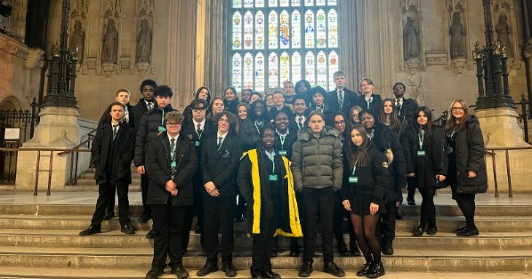 A group photo of students in Parliament